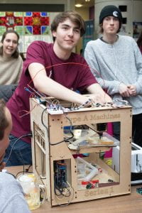 students demonstrate a prototype 3d printer that uses butter