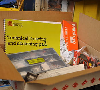 Open box showing the contents of the engineering kit