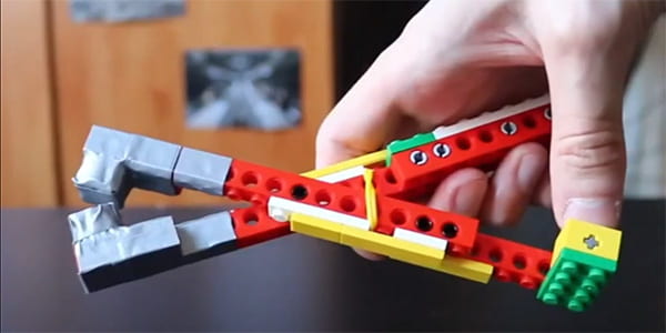 Covid-safe LEGO grabber in hand
