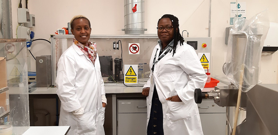 Dr Anita Etale (left) and Dr Amaka Onyianta (right) with the electrospinning equipment in Queens building.