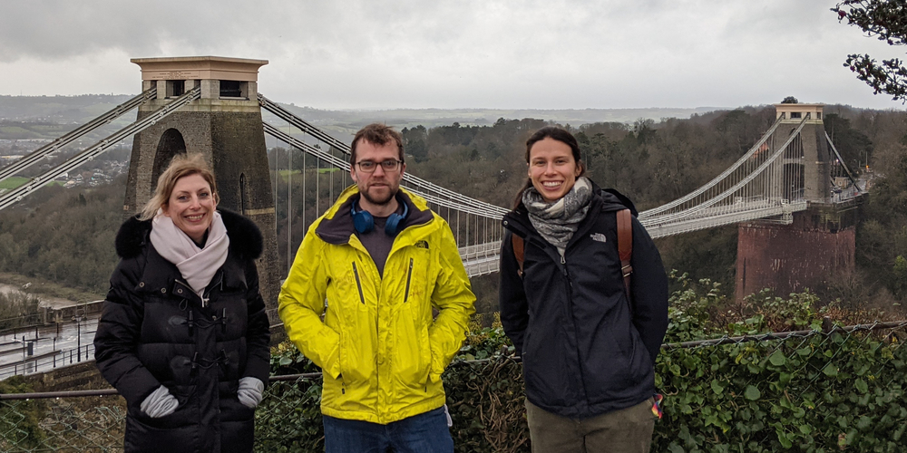 Sam Gunner, Dr Elia Voyagaki and Dr Maria Pregnolato from the Digital Twin team with the Suspension Bridge in background